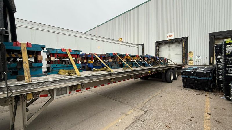 Steel on a Fission flatbed at the dock