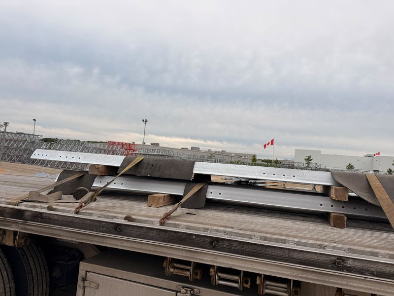 Structural steel strapped on a Fission flatbed