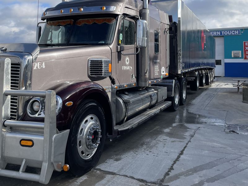 Fission tractor hooked to a trailer, ready for dispatch